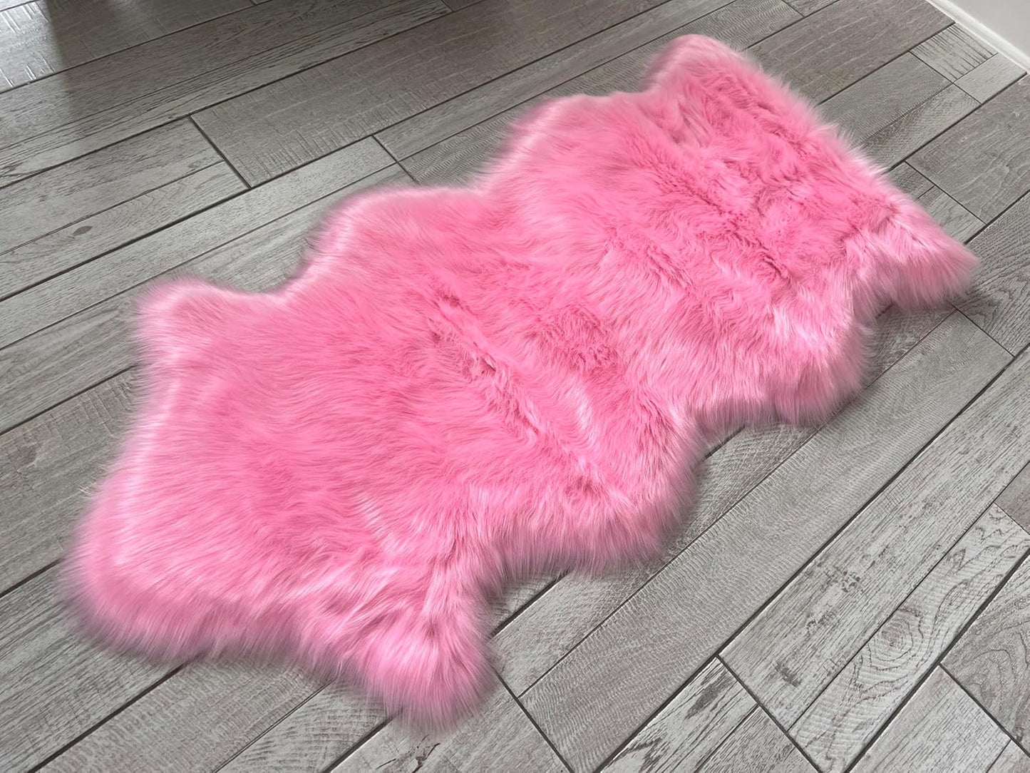 LAMBZY Faux Sheepskin Super Soft Hypoallergenic Free Shape Silky Shag Rug, Luxury Shaggy Plush Carpet for Bedrooms Living Kids Room Sofa Rugs (Pink, Single and a Half 2'x4')